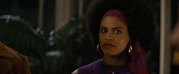 Movie still from “Seberg” (2019), directed by Benedict Andrews – A person wearing a purple shirt; Close Up shot, Low angle