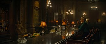 Movie still from “Seberg” (2019), directed by Benedict Andrews – A bar with a lot of lamps on the counter; Wide shot, Over the shoulder angle