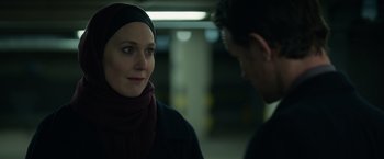 Movie still from “Official Secrets” (2019), directed by Gavin Hood – A woman wearing a headscarf is talking to a man; Close Up shot, Over the shoulder angle