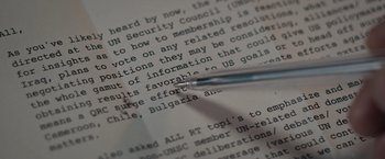 A pen on top of a page