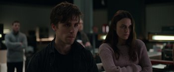 Movie still from “Official Secrets” (2019), directed by Gavin Hood – A man and a woman sitting next to each other in a room; Close Up shot, Over the shoulder angle