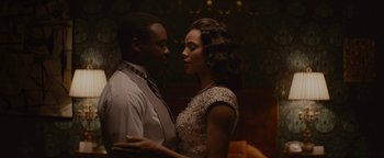 Movie still from “Selma” (2014), directed by Ava DuVernay – A man and a woman standing next to each other; Medium shot, Over the shoulder angle