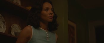 Movie still from “Selma” (2014), directed by Ava DuVernay – A woman in a blue and white dress looking to her left; Close Up shot, Low angle