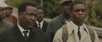 Movie still from “Selma” (2014), directed by Ava DuVernay – A group of men standing next to each other; Close Up shot, Over the shoulder angle