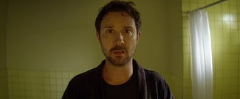 A person wearing a black shirt