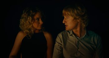 Movie still from “She's Funny That Way” (2014), directed by Peter Bogdanovich – A man and a woman looking at one another; Close Up shot, Over the shoulder angle
