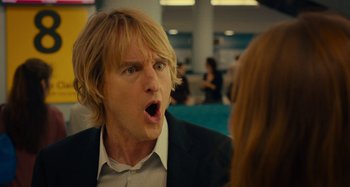 Movie still from “She's Funny That Way” (2014), directed by Peter Bogdanovich – A person talking to another person; Close Up shot, Over the shoulder angle