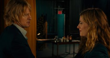 Movie still from “She's Funny That Way” (2014), directed by Peter Bogdanovich – A man and a woman are talking in a room; Medium shot, Over the shoulder angle