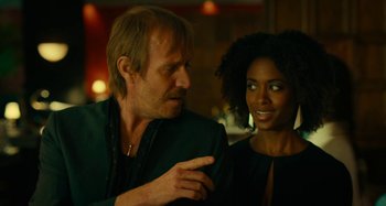 Movie still from “She's Funny That Way” (2014), directed by Peter Bogdanovich – A man and a woman talking to each other; Close Up shot, Over the shoulder angle