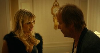Movie still from “She's Funny That Way” (2014), directed by Peter Bogdanovich – A man and a woman talking to each other; Close Up shot, Over the shoulder angle