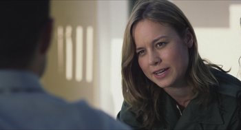 Movie still from “Short Term 12” (2013), directed by Destin Daniel Cretton – A person sitting in front of a window; Close Up shot, Over the shoulder angle