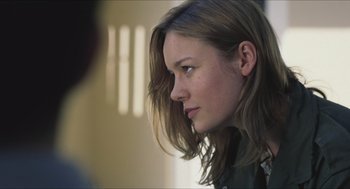 Movie still from “Short Term 12” (2013), directed by Destin Daniel Cretton – A person with long brown hair; Close Up shot, Over the shoulder angle