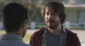 Movie still from “Short Term 12” (2013), directed by Destin Daniel Cretton – A man with a beard talking to another man outside; Close Up shot, Over the shoulder angle