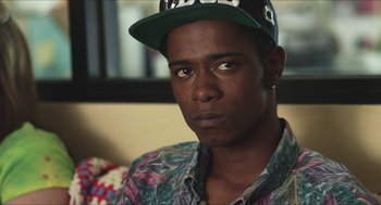 Movie still from “Short Term 12” (2013), directed by Destin Daniel Cretton – A person wearing a hat; Close Up shot, Over the shoulder angle