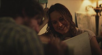 Movie still from “Short Term 12” (2013), directed by Destin Daniel Cretton – A woman brushing her hair in front of a mirror; Close Up shot, Over the shoulder angle