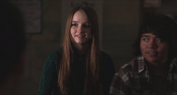 Movie still from “Short Term 12” (2013), directed by Destin Daniel Cretton – A woman with long hair is posing for a picture; Close Up shot, Over the shoulder angle