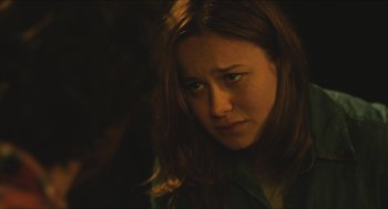 Movie still from “Short Term 12” (2013), directed by Destin Daniel Cretton – A person with long red hair; Close Up shot, Over the shoulder angle