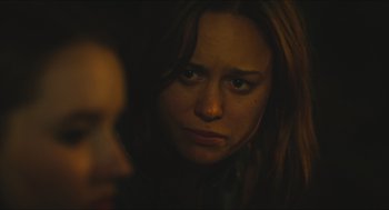 Movie still from “Short Term 12” (2013), directed by Destin Daniel Cretton – A person looking at the camera; Close Up shot, Over the shoulder angle