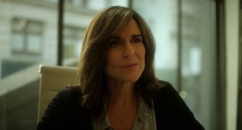 Movie still from “Side Effects” (2013), directed by Steven Soderbergh – A person sitting in a chair; Close Up shot, Low angle