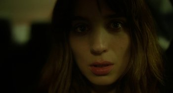 Movie still from “Side Effects” (2013), directed by Steven Soderbergh – A woman's face in the dark; Close Up shot, High angle