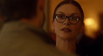 Movie still from “Side Effects” (2013), directed by Steven Soderbergh – A person wearing glasses; Close Up shot, Over the shoulder angle