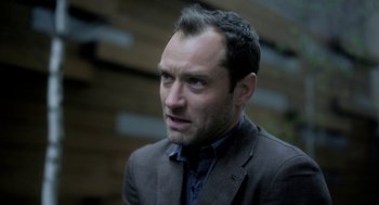 Movie still from “Side Effects” (2013), directed by Steven Soderbergh – A person wearing a suit and tie; Close Up shot, Low angle