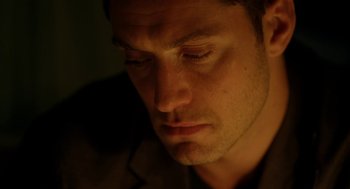 Movie still from “Side Effects” (2013), directed by Steven Soderbergh – A man's face in the dark; Close Up shot, High angle