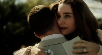 Movie still from “Side Effects” (2013), directed by Steven Soderbergh – A man and a woman embracing each other; Close Up shot, Over the shoulder angle