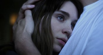 Movie still from “Side Effects” (2013), directed by Steven Soderbergh – A person with blue eyes; Close Up shot, Overhead angle