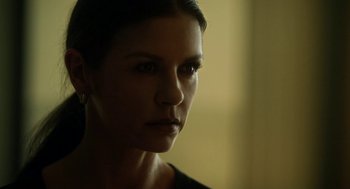 Movie still from “Side Effects” (2013), directed by Steven Soderbergh – A woman's face in the dark; Close Up shot, Low angle