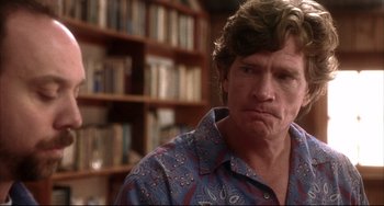 Movie still from “Sideways” (2004), directed by Alexander Payne – A person wearing a blue and red shirt; Close Up shot, Over the shoulder angle