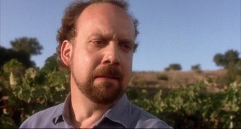 Movie still from “Sideways” (2004), directed by Alexander Payne – A person with a beard; Close Up shot, Over the shoulder angle