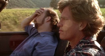 Movie still from “Sideways” (2004), directed by Alexander Payne – A man and a woman sitting next to each other; Close Up shot, Over the shoulder angle