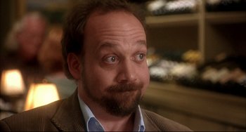 Movie still from “Sideways” (2004), directed by Alexander Payne – A person with a beard; Close Up shot, Over the shoulder angle