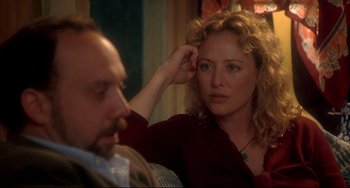 Movie still from “Sideways” (2004), directed by Alexander Payne – A man and a woman sitting on a couch; Close Up shot, Over the shoulder angle