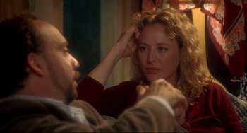 Movie still from “Sideways” (2004), directed by Alexander Payne – A man and a woman looking at each other in a mirror; Close Up shot, Over the shoulder angle