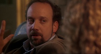 Movie still from “Sideways” (2004), directed by Alexander Payne – A person with a beard; Close Up shot, Over the shoulder angle