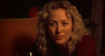 Movie still from “Sideways” (2004), directed by Alexander Payne – A person with curly hair; Close Up shot, Over the shoulder angle