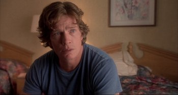 Movie still from “Sideways” (2004), directed by Alexander Payne – A person sitting in a room; Close Up shot, Over the shoulder angle