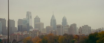 Movie still from “Silver Linings Playbook” (2012), directed by David O. Russell – A view of a city skyline in the daytime; Extreme Wide shot, High angle