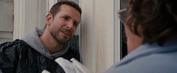 Movie still from “Silver Linings Playbook” (2012), directed by David O. Russell – A person near a wall; Close Up shot, Over the shoulder angle