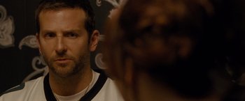 Movie still from “Silver Linings Playbook” (2012), directed by David O. Russell – A man's face in front of a mirror; Close Up shot, Over the shoulder angle