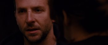 Movie still from “Silver Linings Playbook” (2012), directed by David O. Russell – A man with a beard looking into the distance; Close Up shot, Over the shoulder angle