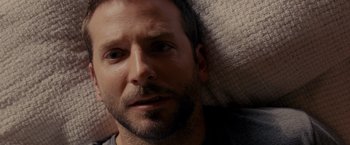 Movie still from “Silver Linings Playbook” (2012), directed by David O. Russell – A person laying on a bed; Close Up shot, High angle