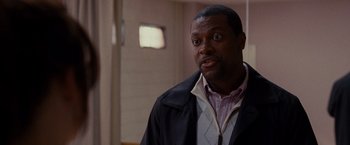 Movie still from “Silver Linings Playbook” (2012), directed by David O. Russell – A person wearing a jacket; Close Up shot, Over the shoulder angle