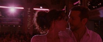 Movie still from “Silver Linings Playbook” (2012), directed by David O. Russell – A man and a woman standing next to each other; Close Up shot, Low angle