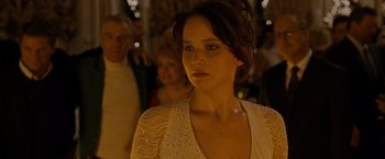 Movie still from “Silver Linings Playbook” (2012), directed by David O. Russell – A person wearing a white dress; Close Up shot, Over the shoulder angle