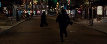 Movie still from “Silver Linings Playbook” (2012), directed by David O. Russell – Two people running down a street at night; Extreme Wide shot, Over the shoulder angle