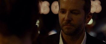 Movie still from “Silver Linings Playbook” (2012), directed by David O. Russell – A person wearing a suit and tie; Close Up shot, Over the shoulder angle