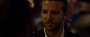 Movie still from “Silver Linings Playbook” (2012), directed by David O. Russell – A person wearing a suit and tie; Close Up shot, Over the shoulder angle